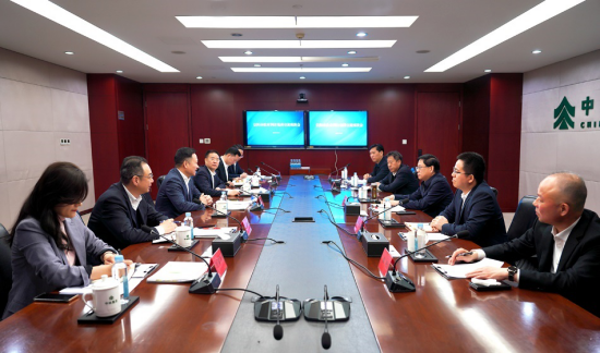 余红辉会见河南省信阳市委副书记、市长陈志伟一行